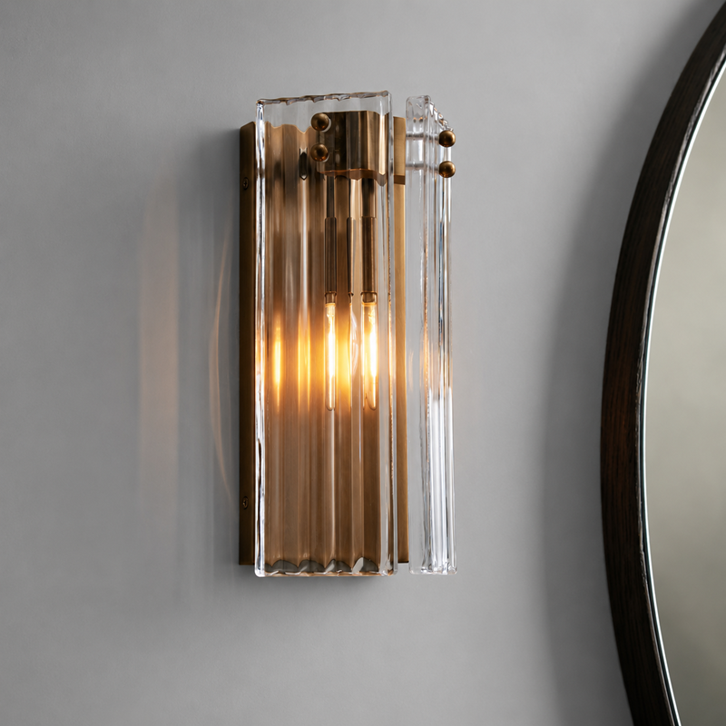 12" Delsie Fluted Glass Wall Light in Brass with Clear Glass, Main Light On