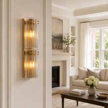 24.2" Delsie Fluted Glass Wall Light in Brass with Clear Glass, Living Room Scene