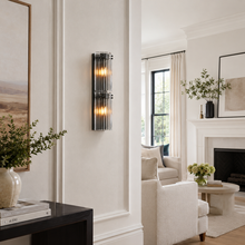 24.2" Delsie Fluted Glass Wall Light in Bronze with Clear Glass, Living Room Scene