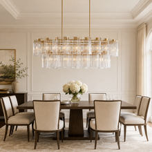 63" Delsie Oval Fluted Glass Chandelier in Brass with Clear Glass, Dining Room