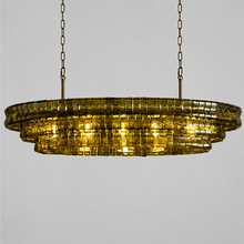 54" Ghiaccio Oval Textured Glass Chandelier with Green Glass and Brass Finish, Light On