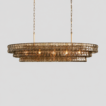 54" Ghiaccio Oval Textured Glass Chandelier with Smoke Glass and Brass Finish, Light On
