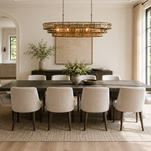 54" Ghiaccio Oval Textured Glass Chandelier with Smoke Glass and Bronze Finish in a Dining Room