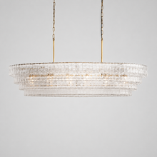 64" Ghiaccio Oval Textured Glass Chandelier with Clear Glass and Brass Finish, Light On