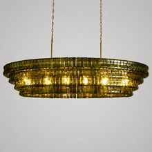 64" Ghiaccio Oval Textured Glass Chandelier with Green Glass and Brass Finish, Light On
