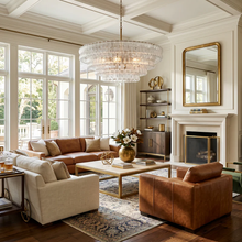 36" Ghiaccio Round Textured Glass Chandelier with Clear Glass and Brass Finish in a Living Room