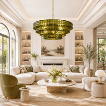 36" Ghiaccio Round Textured Glass Chandelier with Green Glass and Brass Finish in a Living Room