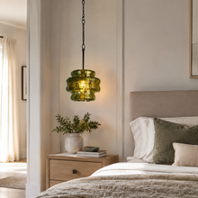 Ghiaccio Textured Glass Pendant with Green Glass and Bronze Finish in a Bedroom