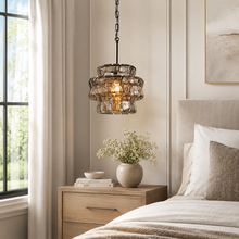 Ghiaccio Textured Glass Pendant with Smoke Glass and Bronze Finish in a Bedroom
