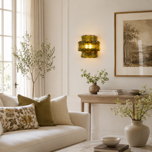 Ghiaccio Textured Glass Wall Light with Green Glass and Brass Finish in a Living Room