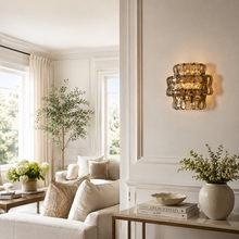 Ghiaccio Textured Glass Wall Light with Smoke Glass and Brass Finish in a Living Room
