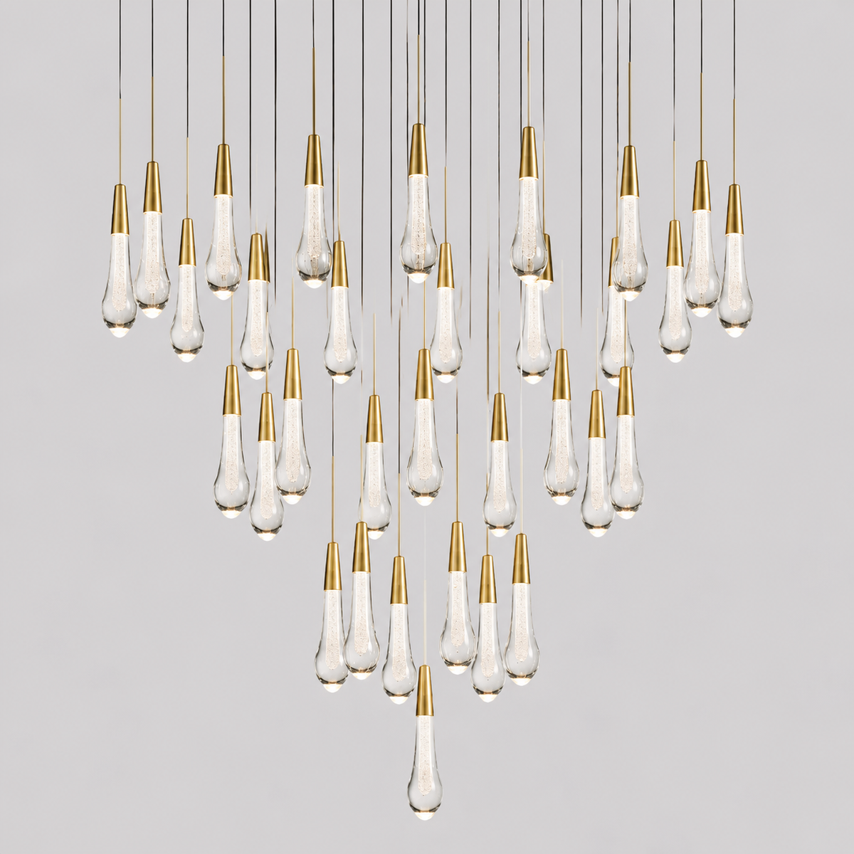 Soltaire Round Bubble Glass Raindrop Chandelier, 36-inch brass modern statement chandelier for dining room, living room, foyer, and round dining table
