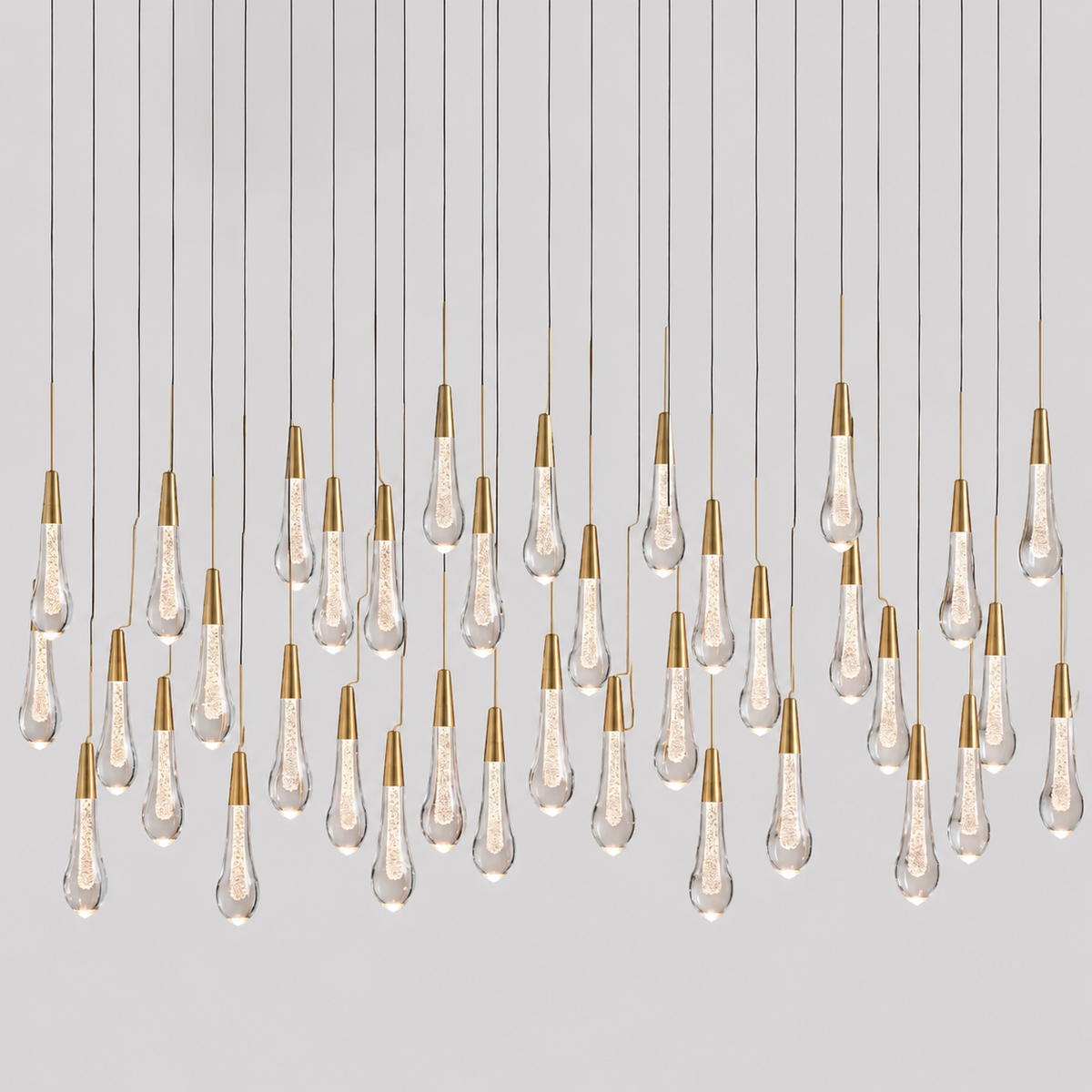 Soltaire Linear Bubble Glass Raindrop Chandelier, 60-inch brass large modern chandelier for long dining table, kitchen island, open-plan kitchen, and contemporary interior