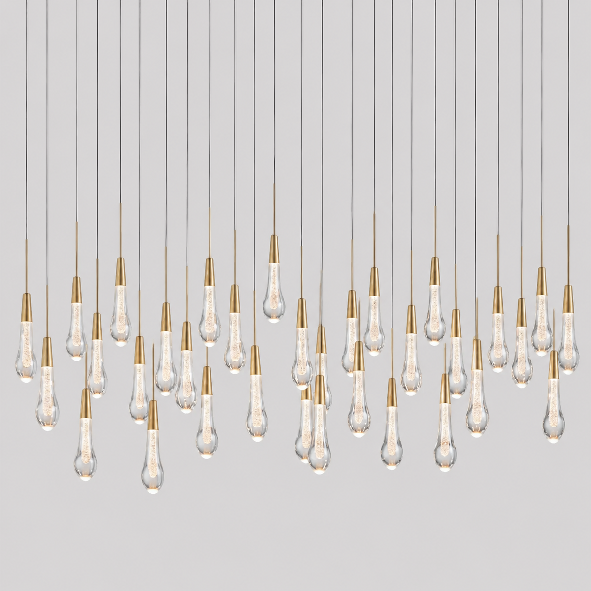 Soltaire Linear Bubble Glass Raindrop Chandelier, 70-inch brass large linear chandelier for oversized dining table, long kitchen island, high ceiling space, and modern interior