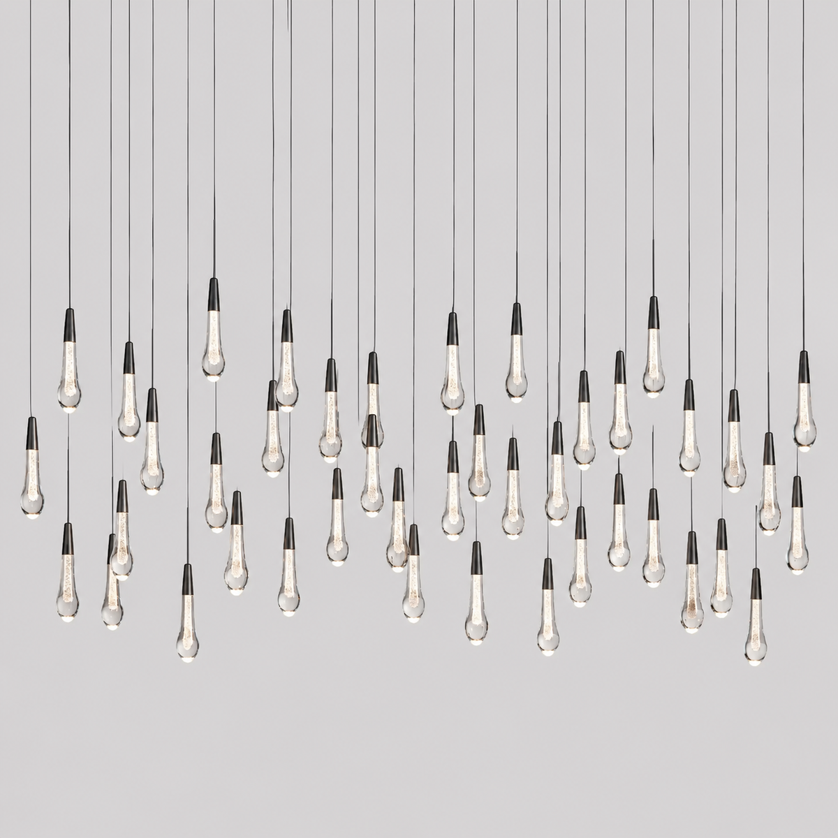 Soltaire Linear Bubble Glass Raindrop Chandelier, 70-inch bronze bubble glass chandelier for large dining room, oversized kitchen island, high ceiling open-plan space, and contemporary interior